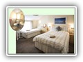 (Room 10) Twin / family room located at the rear of the property on the second floor, with full en-suite shower room.