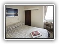 (Room 9) Single room located at the front of the property on the first floor with en-suite shower and toilet. Panoramic foreshore and sea views.